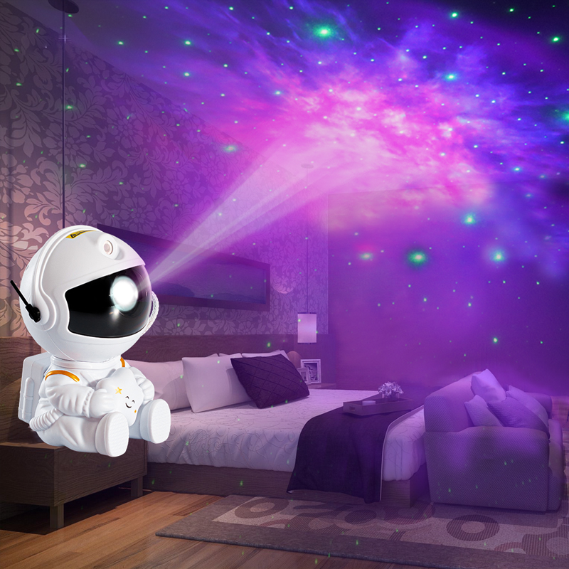 White astronaut lamp projecting a purple galaxy across a bedroom ceiling